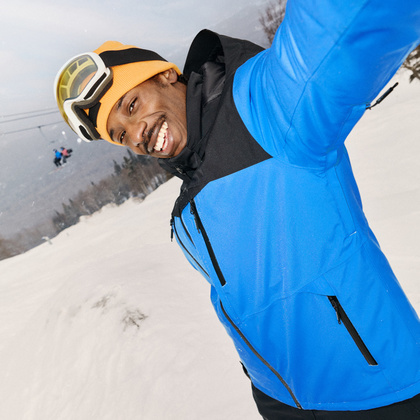 Man downhill skiing