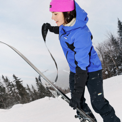 Woman removing skins from her skis