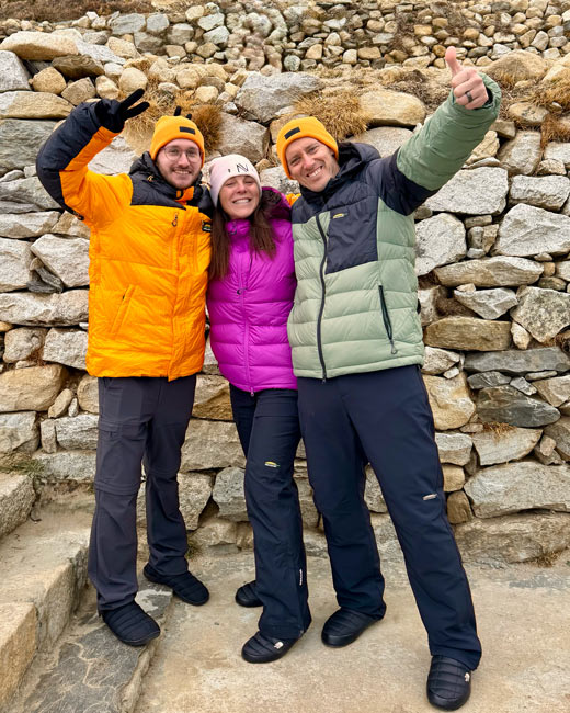 Three people enjoying the outdoors, dressed in warm Chlorophylle clothing
